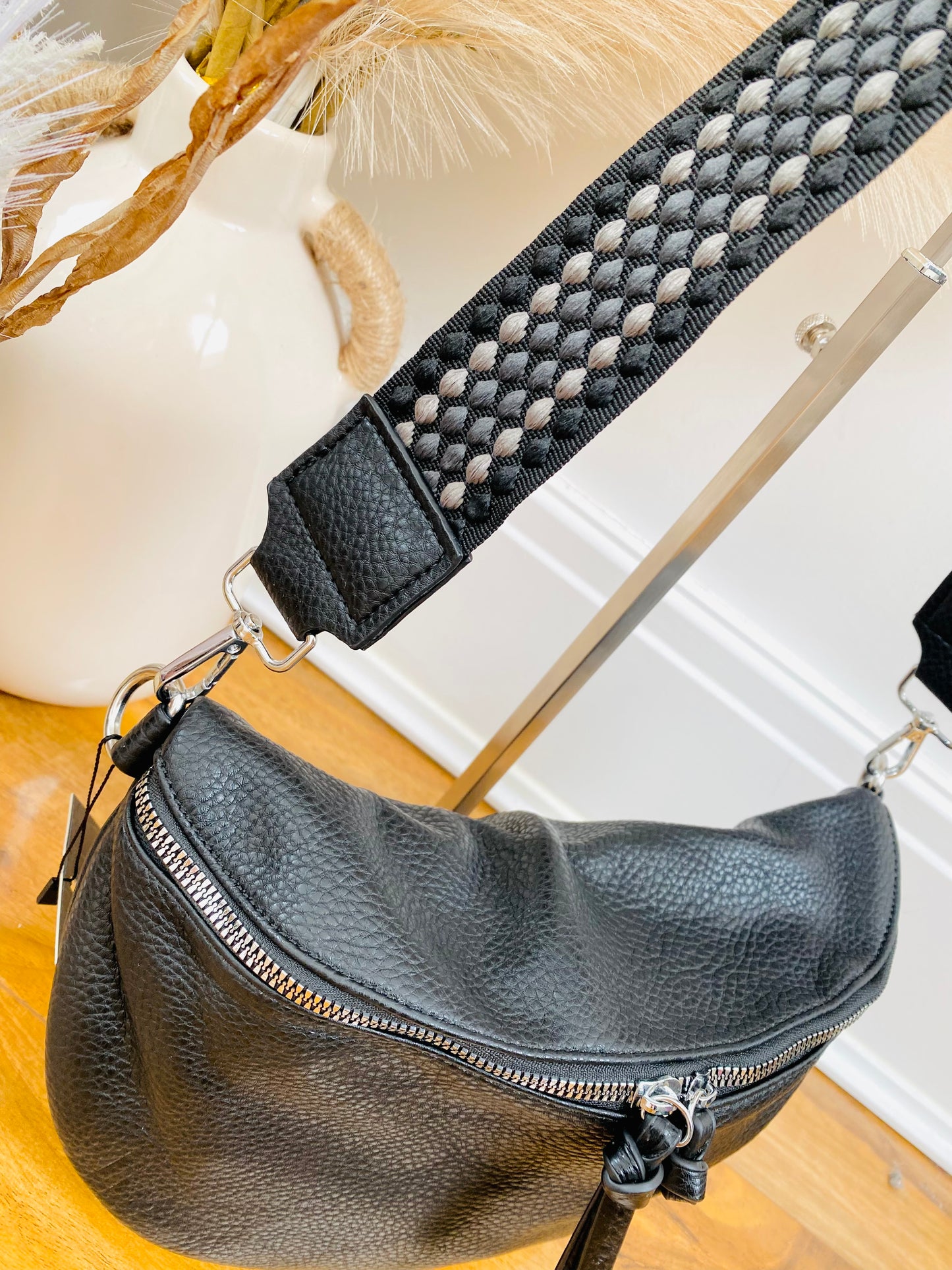 Black faux leather black crossbody bum bag with silver hardware